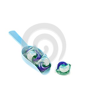 Washing gel capsule pods with laundry detergent isolated on white background. Free space for text