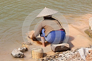 Washing gold in the river