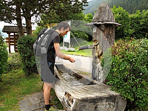 Washing hands at fountain