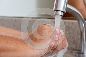 Washing hands with soap for hygiene and health care to prevent corona virus 21