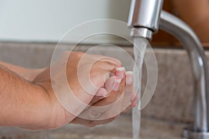 Washing hands with soap for hygiene and health care to prevent corona virus 22