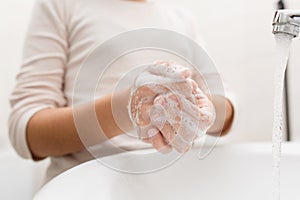 Washing hands with soap