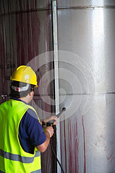 Washing the industrial premises