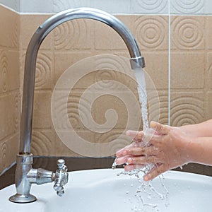 Washing kid hands,Hygiene. Cleaning Hands photo