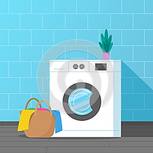 Washing machine with a basket of dirty linen. laundry room interior