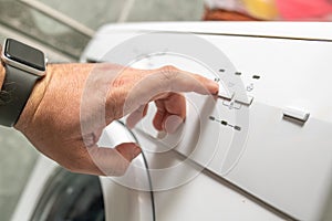 Washing machine button