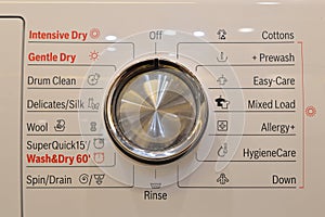 The washing machine buttons are surrounded by various functions, allowing for customized washing cycles tailored to your laundry