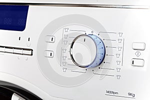 The washing machine - a close up of the display and a choice of programs