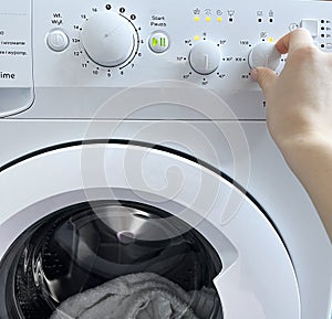 Washing machine control panel close-up