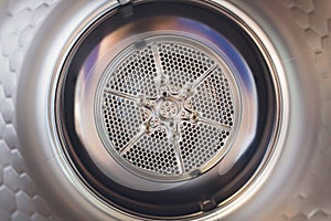 Washing machine drum interior, Internal view of an empty washing machine drum.