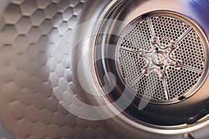 Washing machine drum interior, Internal view of an empty washing machine drum.