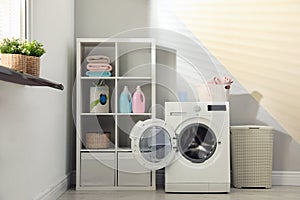 Washing machine in laundry room interior