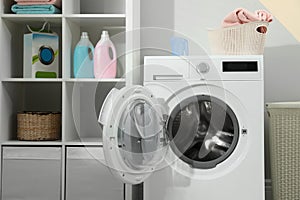 Washing machine in laundry room interior