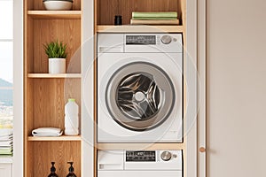 Washing machine in laundry room interior with accessories and panoramic window