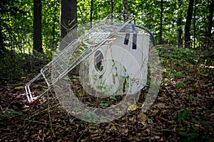 a washing machine and one clothes horse were illegally disposed of in a forest