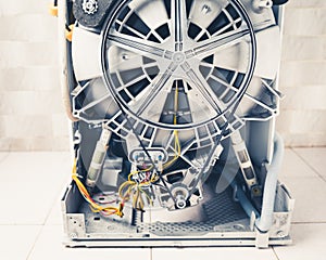 Washing machine with open enclosure is ready for service