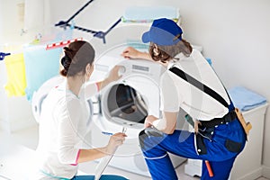 Washing machine repair technician. Washer service.