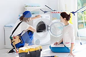 Washing machine repair technician. Washer service.