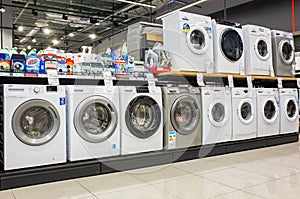 Washing machines displayed in the showroom of a commercial store. Minsk, Belarus - February, 2022