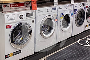 Washing machines displayed in the showroom of a commercial store. Minsk, Belarus - February, 2022