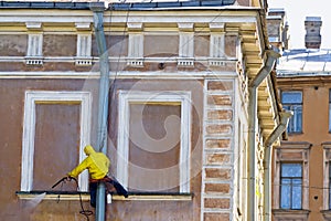 Washing old building facade