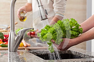 Washing vegetables for a salad