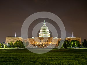 Washington DC, District of Columbia [United States US Capitol Building, night view with lights over reflecting pond,