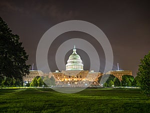 Washington DC, District of Columbia [United States US Capitol Building, night view with lights over reflecting pond,