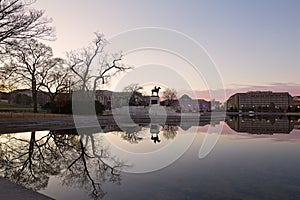 Washington DC panorama with reflection pool at sunrise during winter.