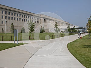 WASHINGTON, DC - SEPTEMBER 2004: Locals and tourists walk near the Pentagon main entrance. The Pentagon is the world's largest