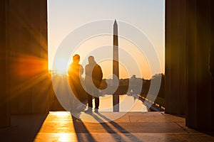 Washington DC, silhouettes at Lincoln Memorial at sunrise