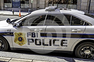 Washington, DC, USA- January 12, 2020: A FBI police car at the J. Edgar Hoover FBI Building in Washington, DC.