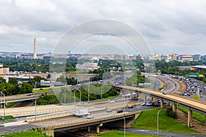 Washington DC . The Washington Monument a with congested highways in the foreground.