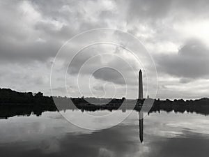 Washington Monument reflected in the Tidal Basin on a cloudy day