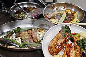 wastage of food, tray full of leftover food for disposs, mostly seeing in hotels and party events