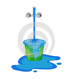 Wastage of water theme. Wastage of water from running tap as bucket is overflow with the water. Wastage of water drop from