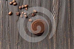 Waste coffee on a black wooden background top view