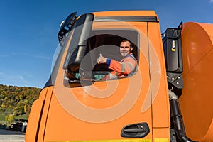 Waste collector driving photo