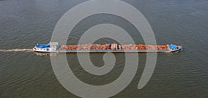 Waste disposal on cargo ship. Boat and scrap metal