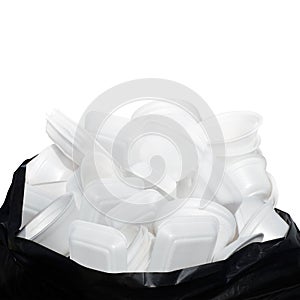 Waste Garbage foam food tray white many pile on the plastic black bag dirty isolated on white background, Trash, Recycle, foam