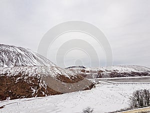 A waste heap or waste heap is a dump, an artificial embankment made of waste rock extracted during underground mining of mineral