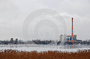 Waste incinerator plant with smoking smokestack. The problem of environmental pollution by factories.