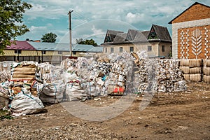 Waste paper recycling. This paper mill is a factory devoted to making paper and cardboard from recycled paper using a Fourdrinier