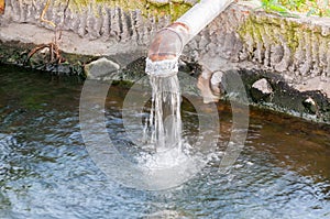 Waste pipe or drainage polluting environment,Drain water,allow to drain into the canal