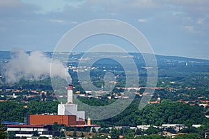 Waste recycling plant pollutes the atmosphere with air emissions on the outskirts of the city Toulouse, France.