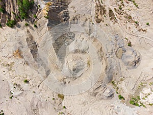 Waste rock dumps of abandoned ilmenite quarry, vertical aerial view