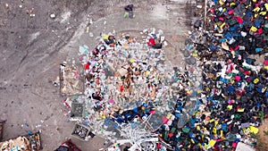 A waste sorting center for recycling. The recyclable paper packaging, cardboard box, plastic, aluminium, glass and metal