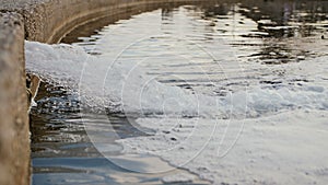 The waste water pipe from the village into the canal