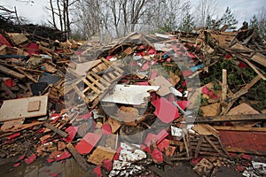 waste wood waste pallets firewood wood chips plywood for processing into chips stacked in a pile