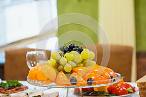 Wasted food on festive table after dinner party